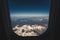 Himalaya mountain and blue sky horizon from airplane window