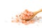 Himalayan Rock pink Salt on wood spoon isolated on white