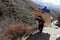 Himalayas,Nepal- cirka November, 2017: hikers and porters on the way to Everest Base Camp, beautiful sunny weather and spectacular