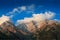 Himalayas summits in clouds on sunset