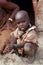 Himba child in a traditional rural village