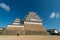 Himeji Castle fortification against blue skies in Himeji, Hyogo