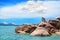 Hin Ta and Hin Yai rocks close up, Grandmother and Grandfather stones on blue sea and sunny cloudy sky background, Samui, Thailand