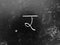 Hindi Script Handwritten on Blackboard. Translation: Written hindi script letter as \