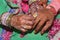 A Hindu boy and girl wearing a ring to each other during the engagement.It is believed by Hindus that silver ring is worn first as
