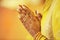 Hindu Bride crossing hands for prayer on her  wedding eve