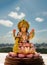 Hindu cosmos Maha laxshmi statue decorated with Flower Garland with nature background