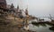 Hindu cremation ceremony at Manikarnika Ghat on banks of holy Ganges river. Varanasi Uttar Pradesh India