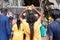 Hindu devotee carrying a burden into Batu Caves area at Thaipusam