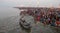 Hindu devotees come to confluence of the Ganges River for holy dip during the festival Kumbh Mela