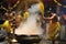 Hindu devotees perform the turmeric bathing ritual during the annual festival held at Amman temple