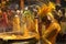 Hindu devotees perform the turmeric bathing ritual during the annual festival held at Amman temple