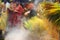 Hindu devotees perform the turmeric bathing ritual during the annual festival held at Amman temple