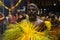 Hindu devotees perform the turmeric bathing ritual during the annual festival held at Amman temple