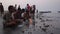Hindu devotees praying before their holy dip during Rash Mela festival at Dublar Char Dubla island , Bangladesh.