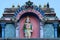 Hindu divinity sculptures on the roof of temple in Batu Caves campus