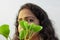 Hindu girl face beauty with green leaves