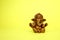 Hindu god Ganesh on yellow background. space for text