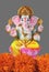 Hindu God Ganesha with marigold flower
