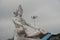 Hindu god Shiva sculpture sitting in meditation on Ganges river in Rishikesh, India