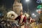 Hindu men at the religious Ganga Aarti ritual, fire puja in Varanasi, India