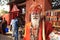 Hindu monk whose face smeared with ash stands in the ghats of the river Ganges