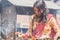 Hindu Nepali Women offering prayers with lighing lamp in the Temple at Teej Festival in Kathmandu