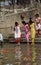 Hindu people bathing in the ghat near the Dakshineswar Kali Temple in Kolkata