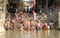 Hindu people bathing in the ghat near the Dakshineswar Kali Temple in Kolkata