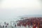 Hindu people, group in red at the sea in Tamil Nadu, India