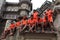 Hindu pilgrims wearing saffron dress looks as they visit the Kashi Viswanath temple