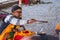 A Hindu priest offering oblations in the fire at the Kumbha Mela in India.