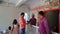 Hindu priest in the temple. Religious men offering prayer in temple and taking auspicious wishes from sacred priest