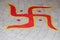 A Hindu religion Swastik sign red rangoli