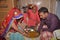 A Hindu ritual in which newly wedded couples are fed a game of ring.