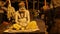 Hindu sadhu holy man meditating on the ground in Varanasi.