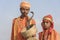 Hindu sadhu holy men and snake cobra in Pushkar, India, close up portrait