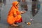 A Hindu woman praying at the Ganges .