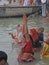 Hindus perform ritual puja at dawn in the Ganges