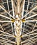 Hinged metal structures on the ceiling