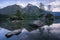 Hintersee Lake with reflection of Watzmann mountain peaks. Ramsau Berchtesgaden Bavaria, Germany, Europe