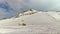 Hintertux glacier, Tirol, Austria - February 17, 2020 - rescue helicopter in action. Evacuation of damaged skiers. Time