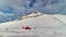 Hintertux glacier, Tirol, Austria - February 17, 2020 - rescue helicopter in action. Evacuation of damaged skiers. Time