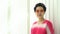 Hip cool Asian senior elder woman smile to camera in red pink hip fashion
