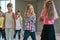 Hip hop style. Group of cute positive children learning a modern dance in the dance studio. Choreography class