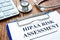 Hipaa risk assessment form and stethoscope