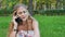 Hippie girl  speaks on the phone romantic vintage