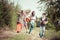 Hippie Group Dancing in the Countryside