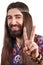 Hippie with long hair making peace sign