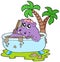 Hippo taking mud bath